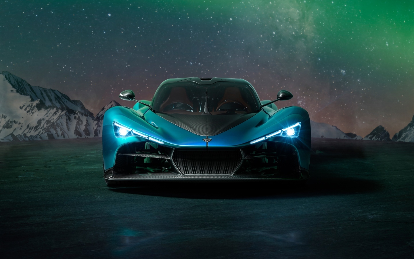 Вид спереди на дорогой автомобиль Zenvo Aurora Agil  ночью