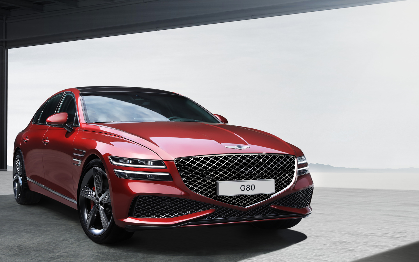 Стильный Genesis G80 Sport 2023 года вид спереди