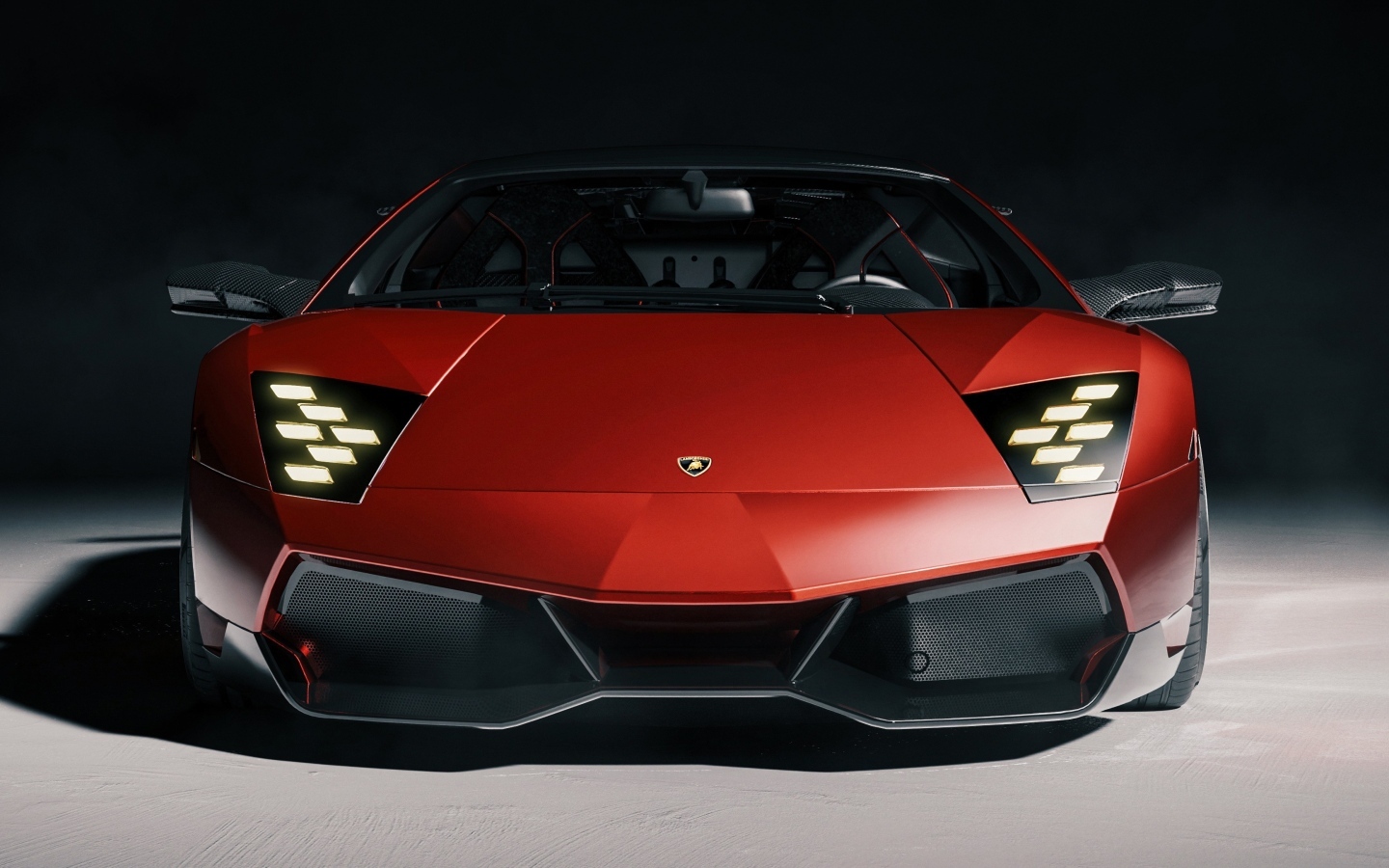 Вид спереди на красный автомобиль  Lamborghini Murcielago