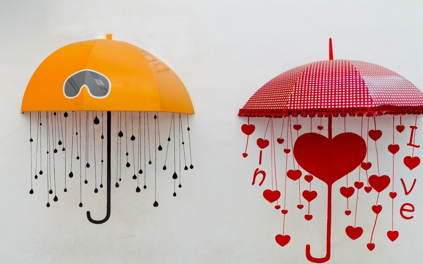 Два нарисованных зонта на серой поверхности