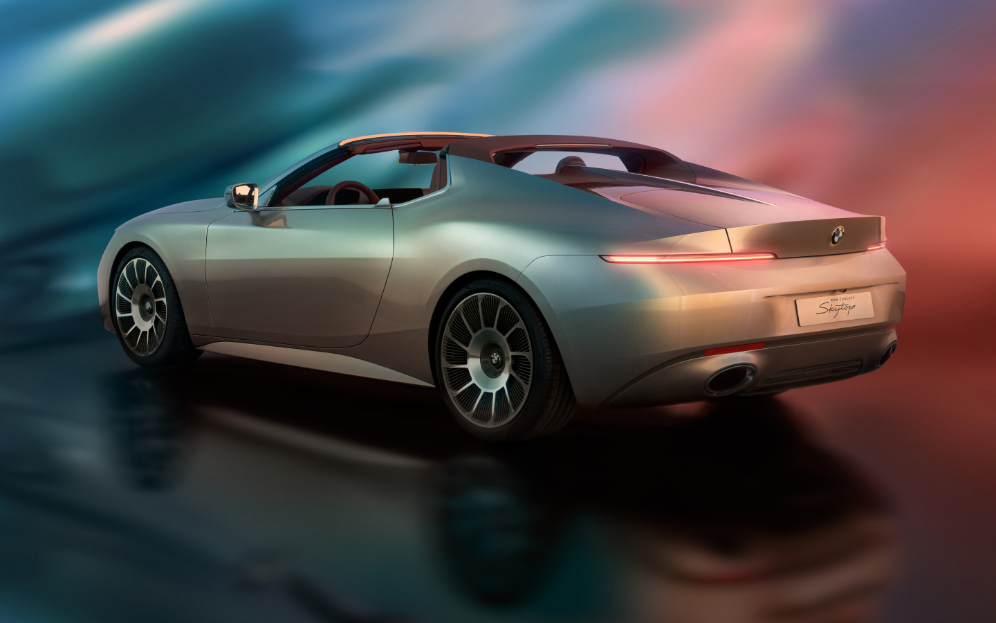 Вид сбоку на автомобиль  BMW Concept Skytop 2024