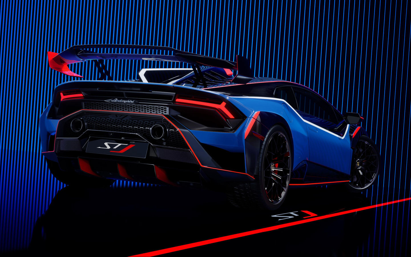 Вид сзади на спортивный автомобиль Lamborghini Huracán STJ