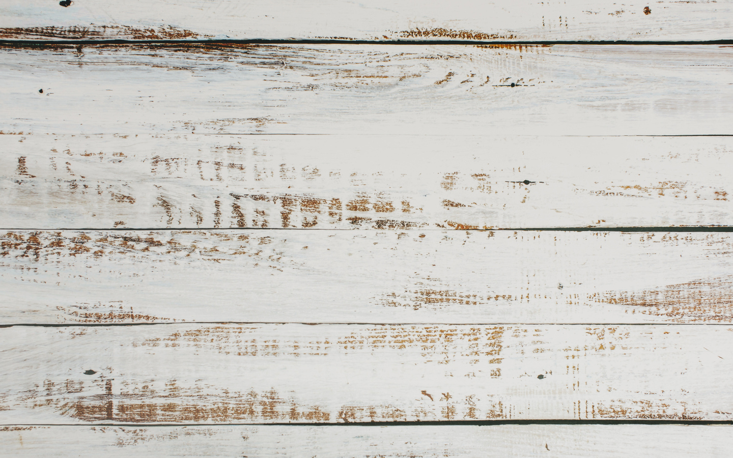 Окрашенная белой краской деревянная поверхность