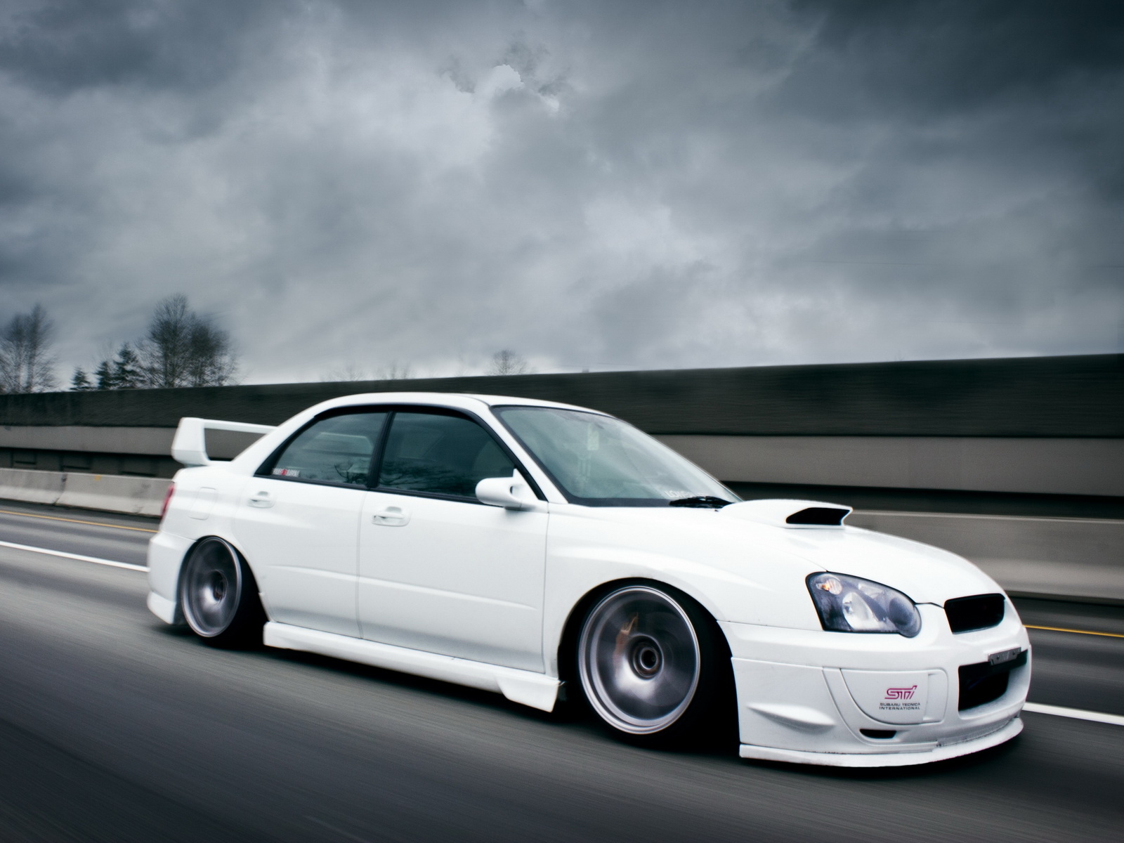 white Subaru Impreza STI