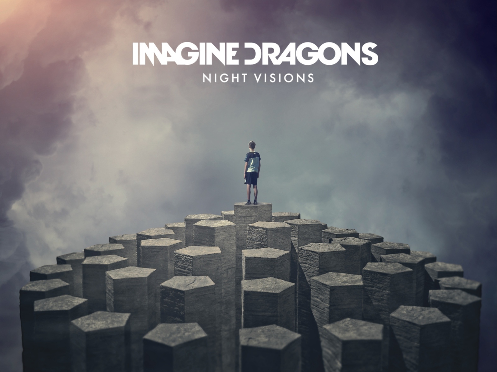 Imagine Dragons: человек на скале