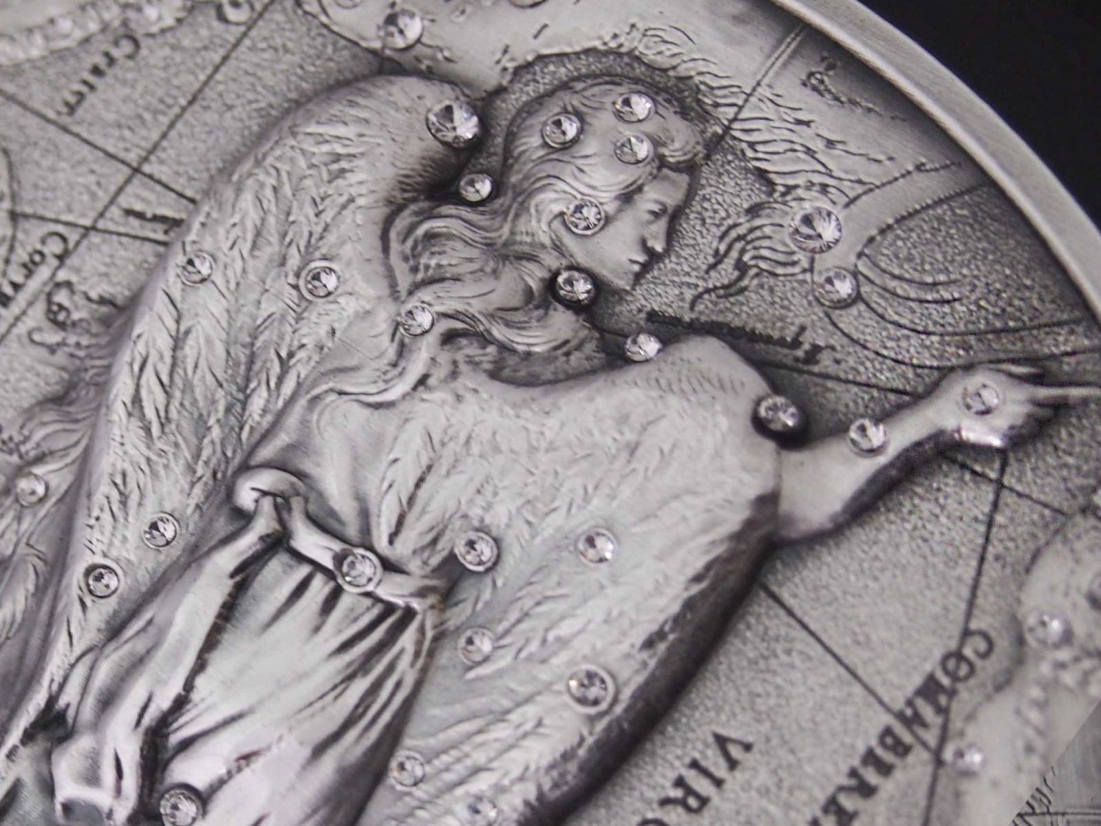 Дева на монете