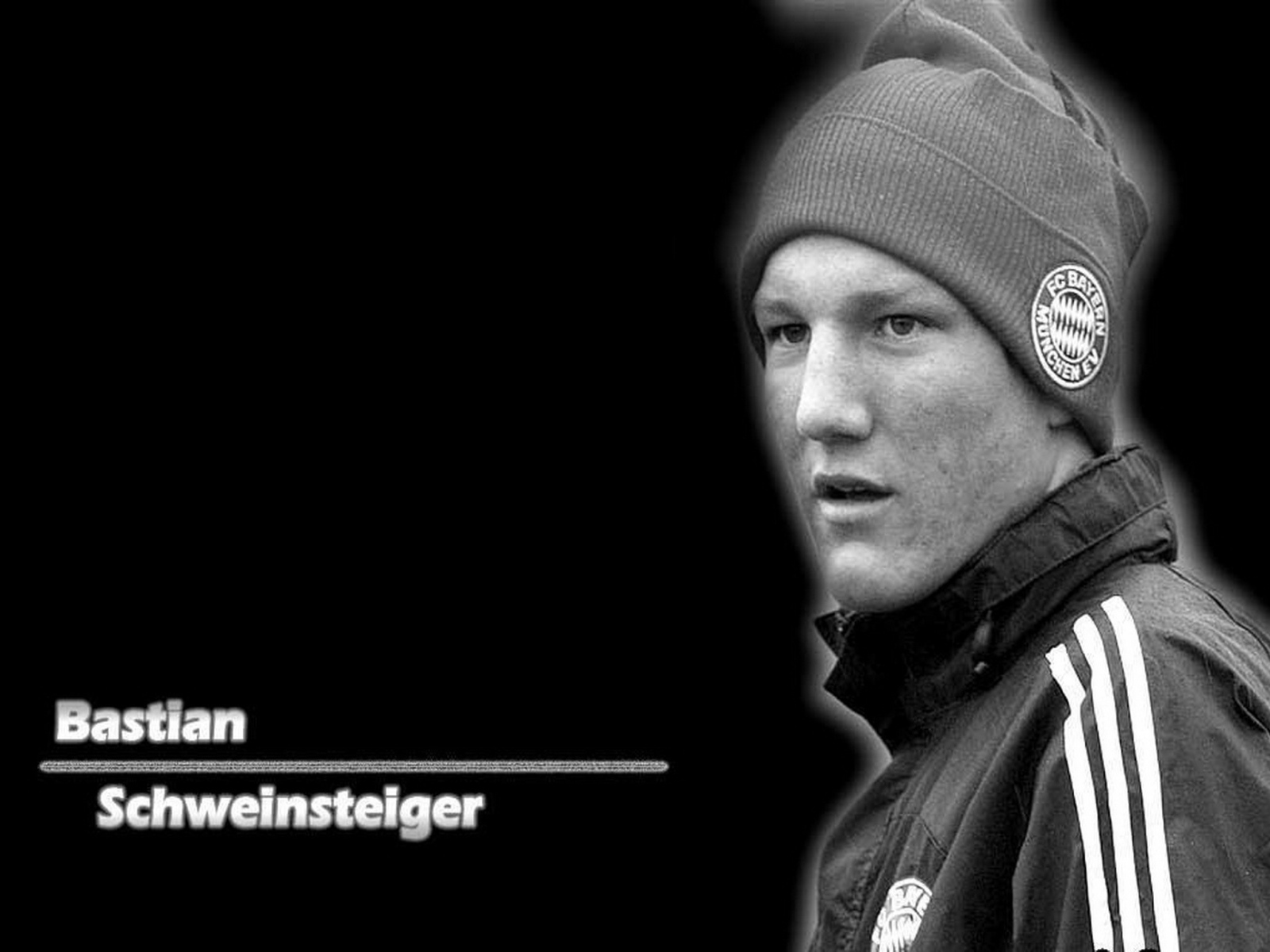 The best player of Bayern Bastian Schweinsteiger on black background