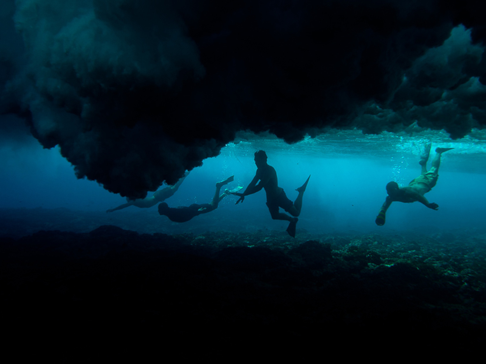 Подводная фотография ныряльщиков