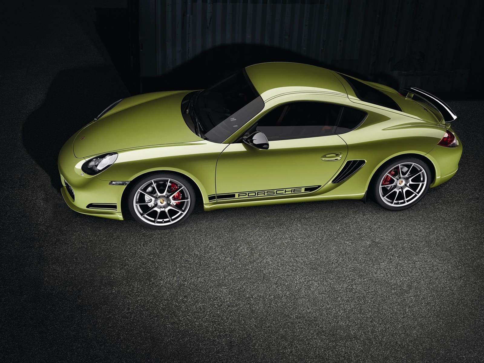 Зеленый Porsche cayman