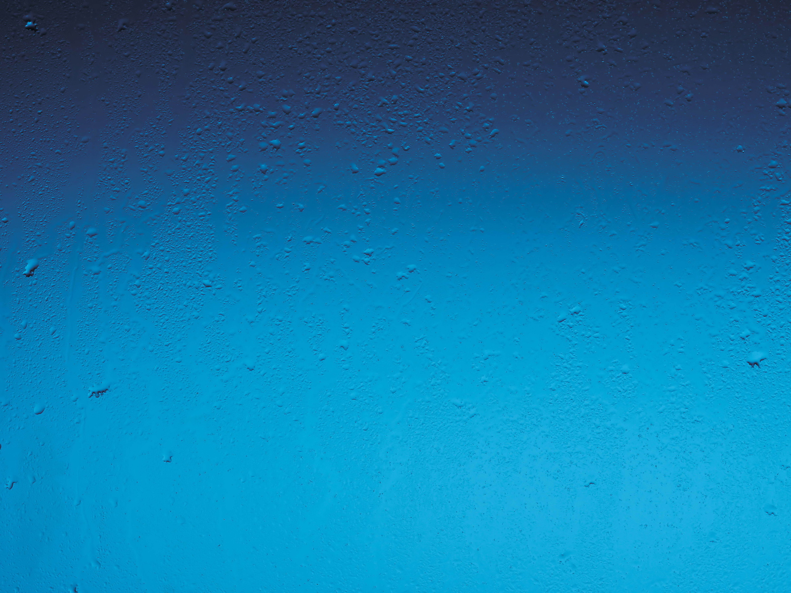 Капли на синем окне