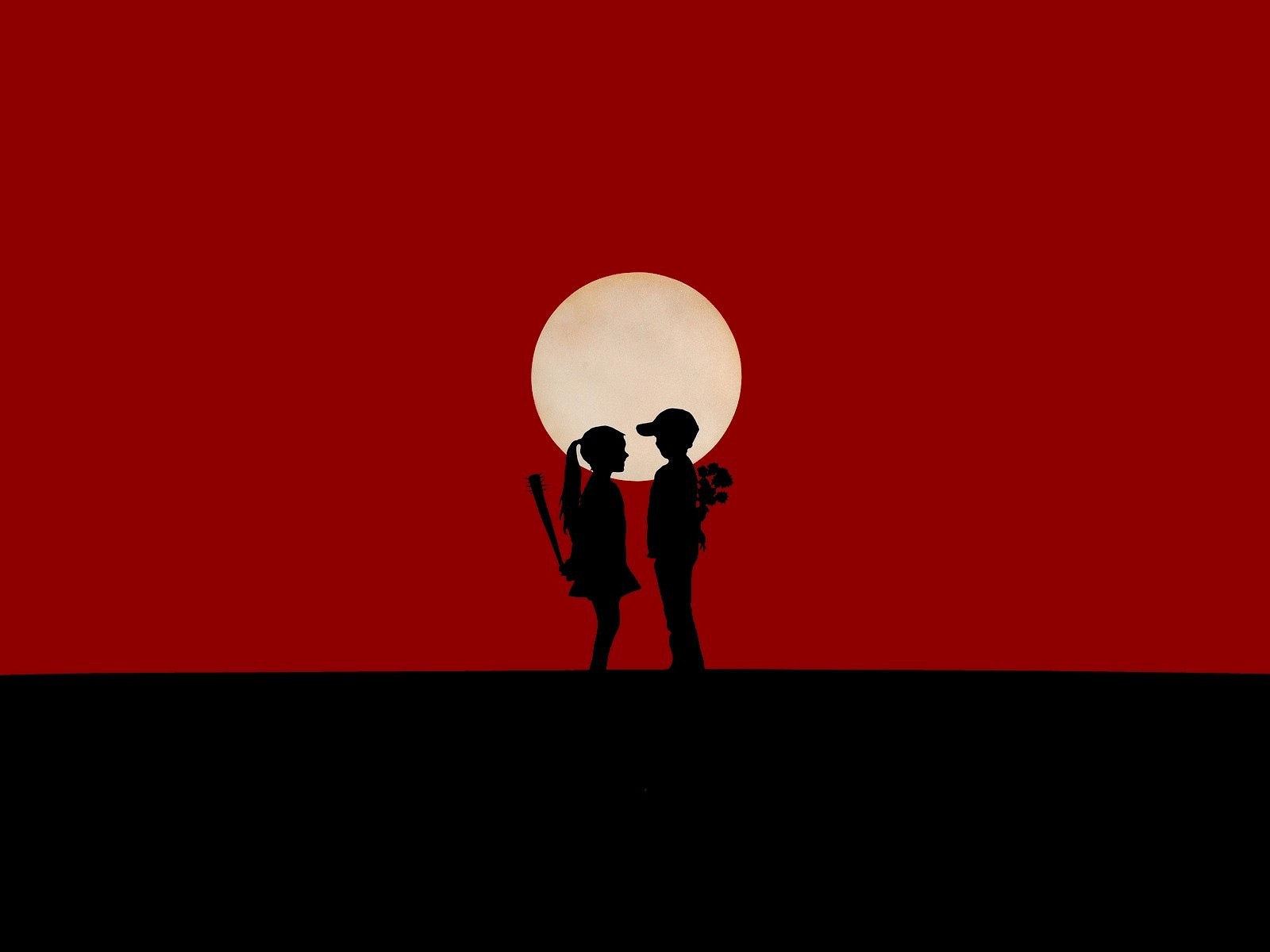 Мальчик и девочка на красном фоне