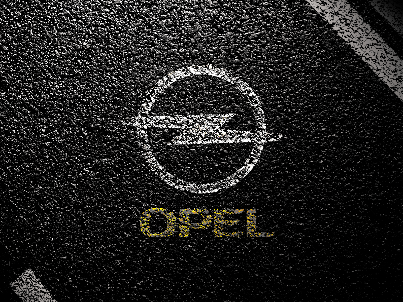 Символ Опель на асфальте