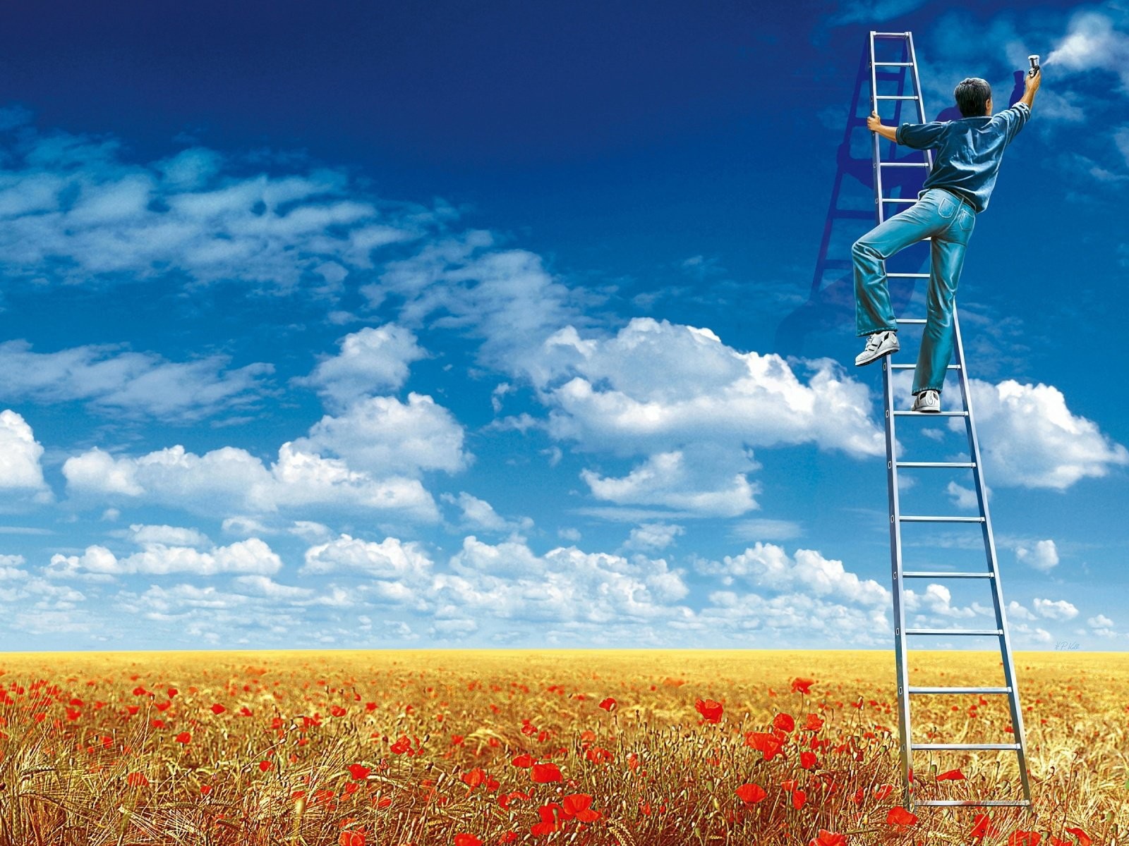 Мужчина рисует облака