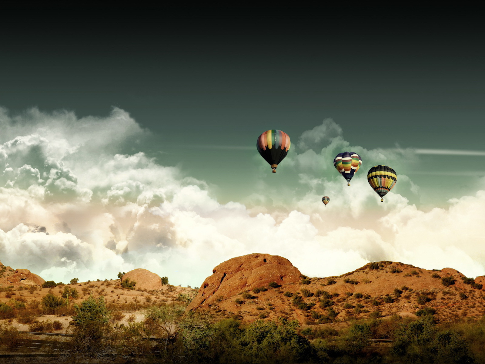 Воздушные шары над холмами