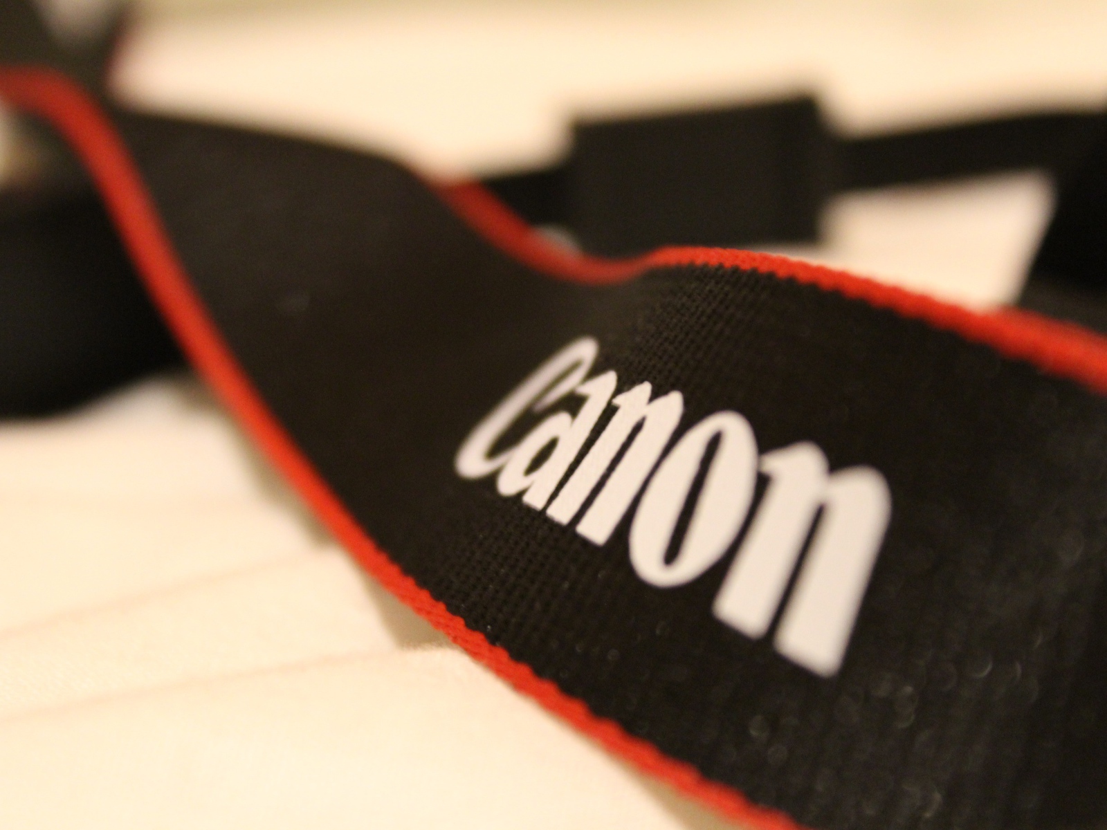 Ремешок от фотоаппарата Кэнон
