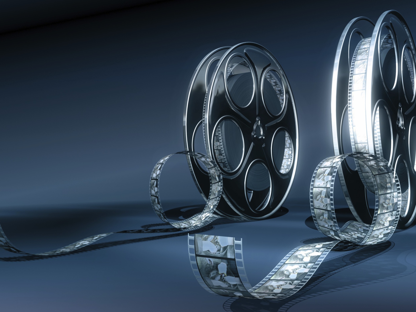 Кинопленка на бобине серый фон 