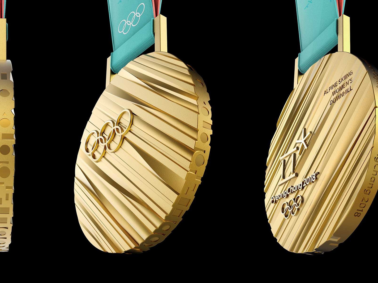 Золотая медаль зимних Олимпийских игр 2018 на черном фоне