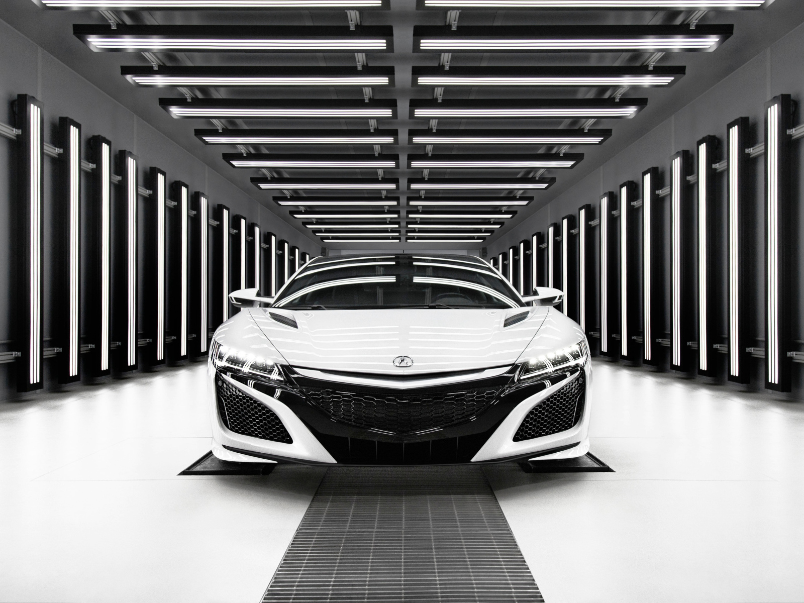 Белый автомобиль Acura NSX, 2019  вид спереди