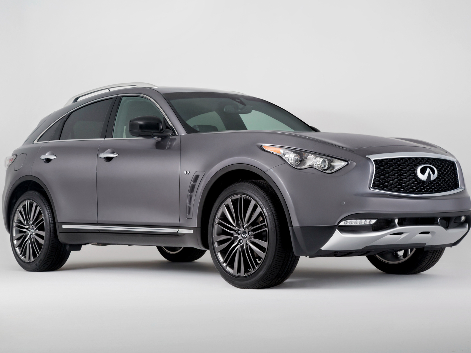 Silver car Infiniti QX70 on a gray background