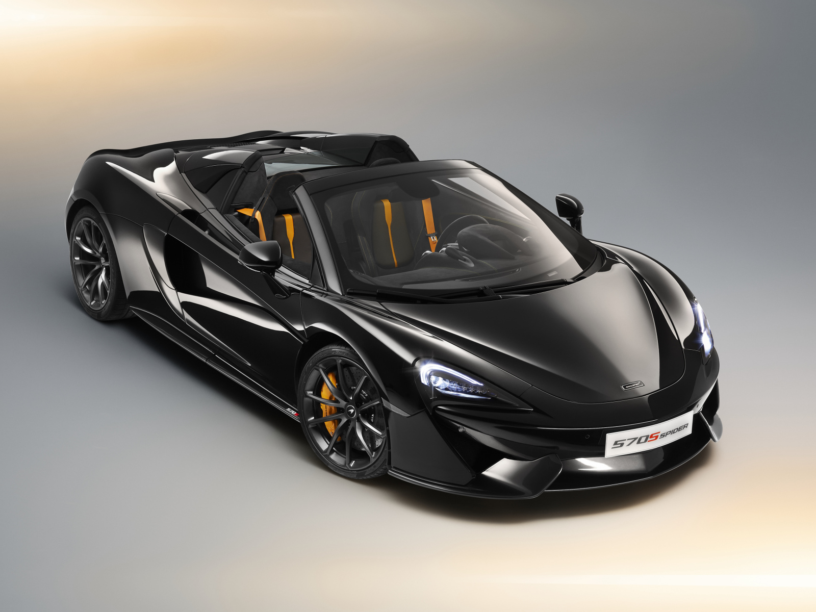 Черный автомобиль кабриолет McLaren 570S Spider, 2018