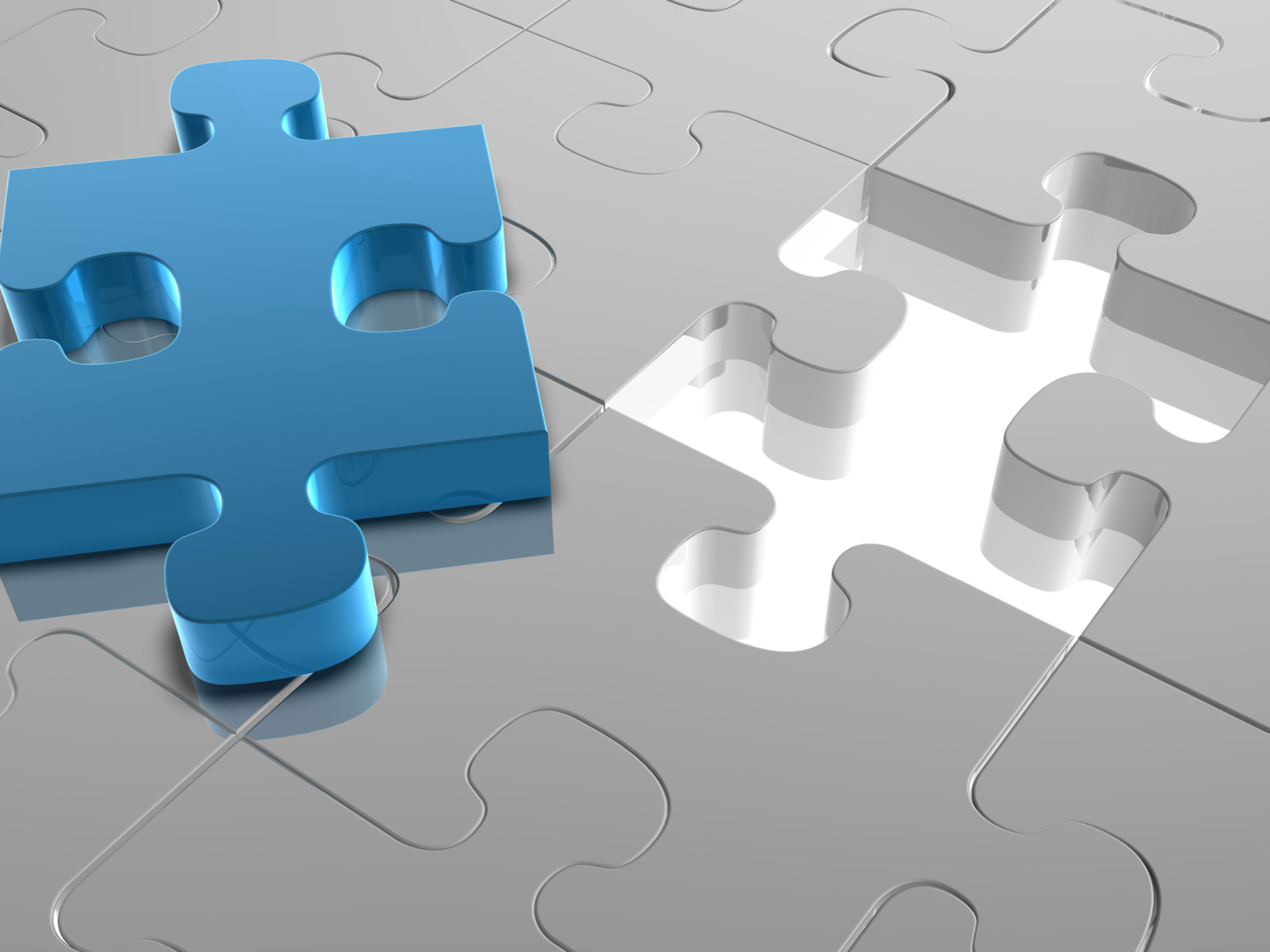 Голубой пазл на сером рисунке 
