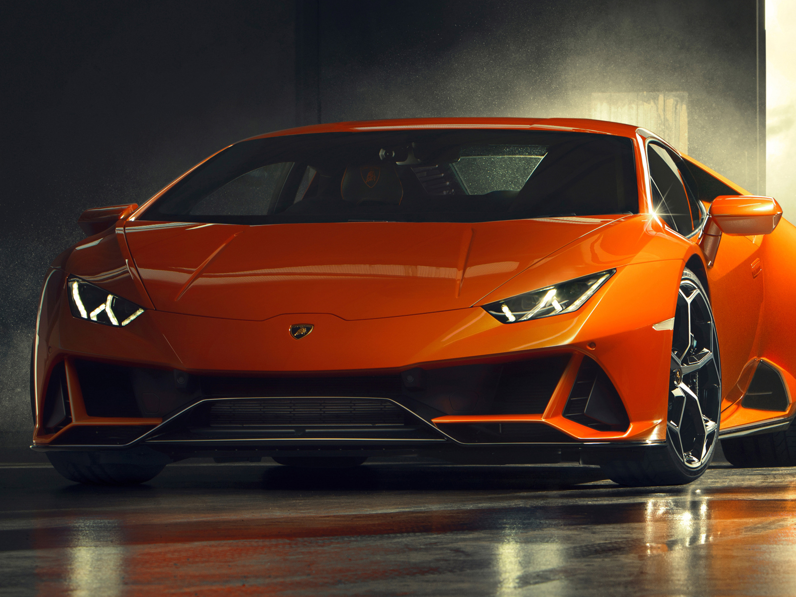 Orange sporty Lamborghini Huracan EVO, 2019 in the garage