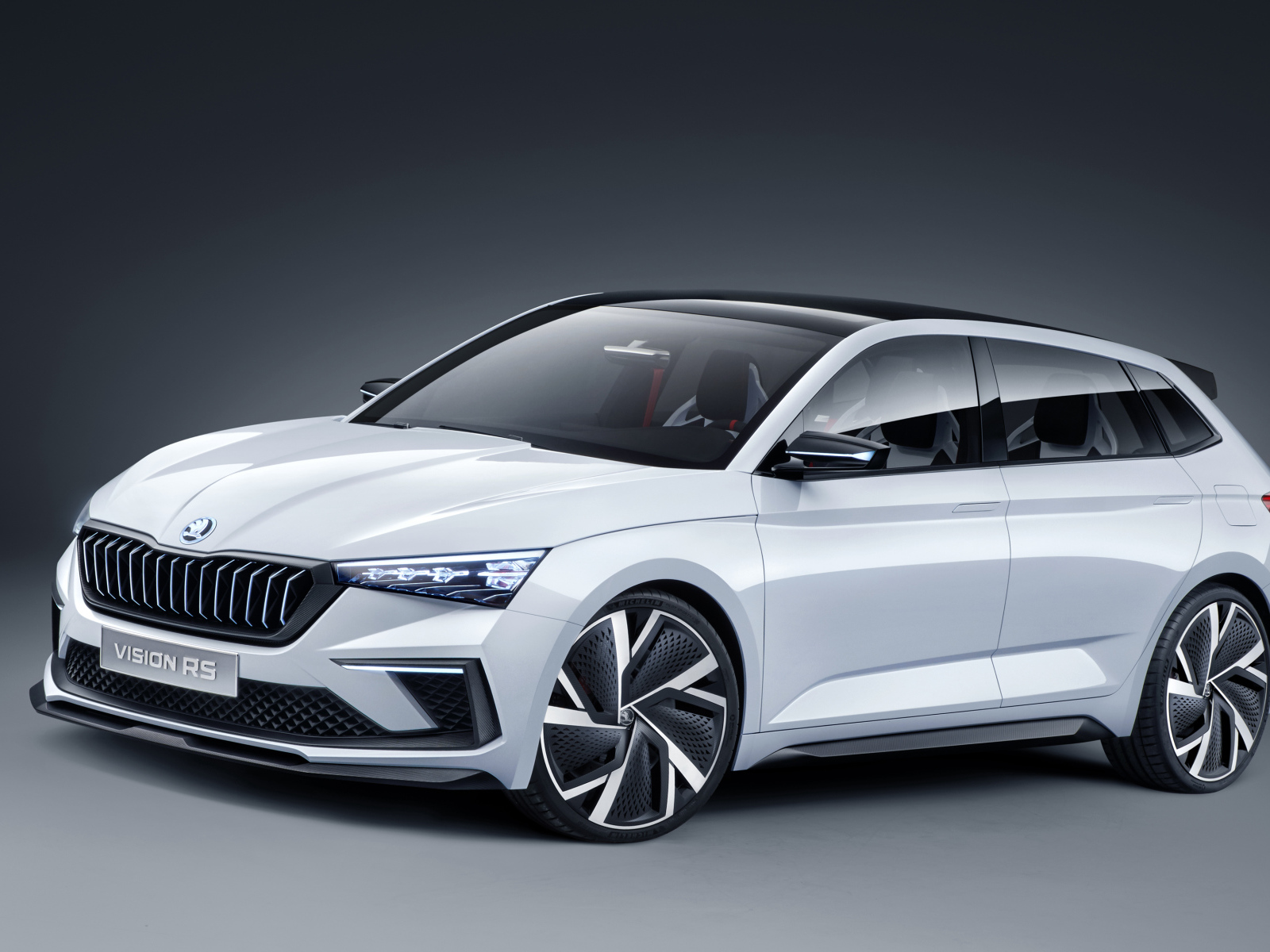 White car Skoda Vision RS 2018 on a gray background