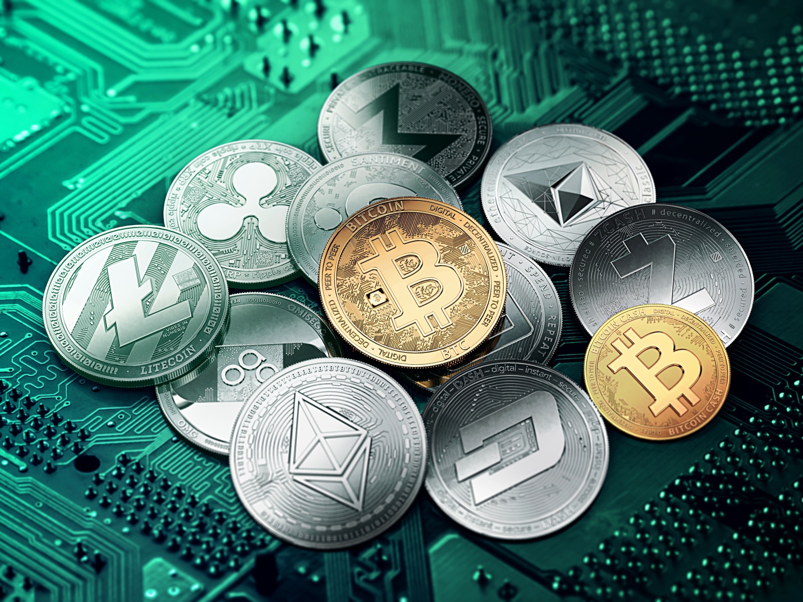 Cryptocurrency coins are on the computer board