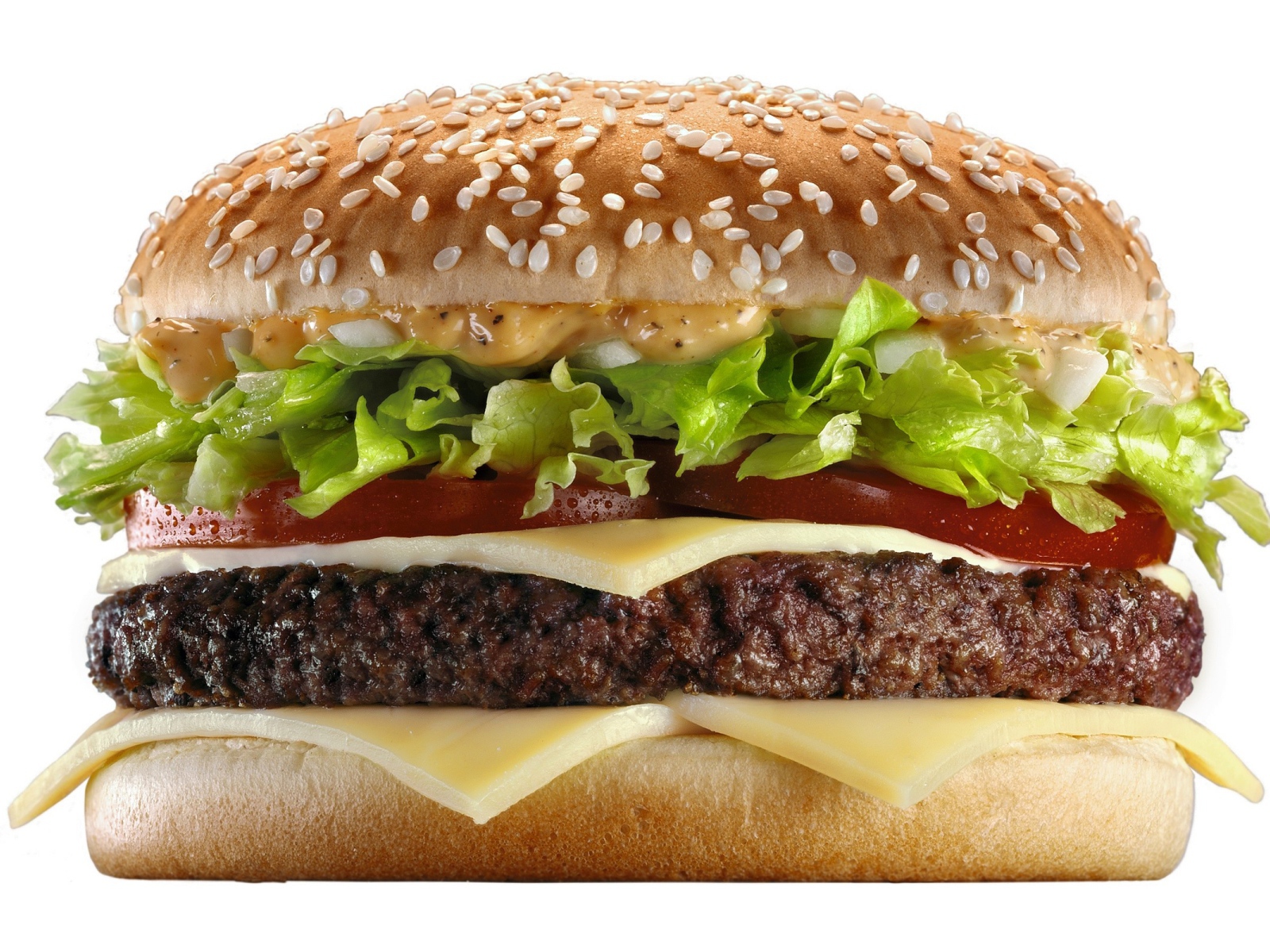 Большой сочный гамбургер на белом фоне