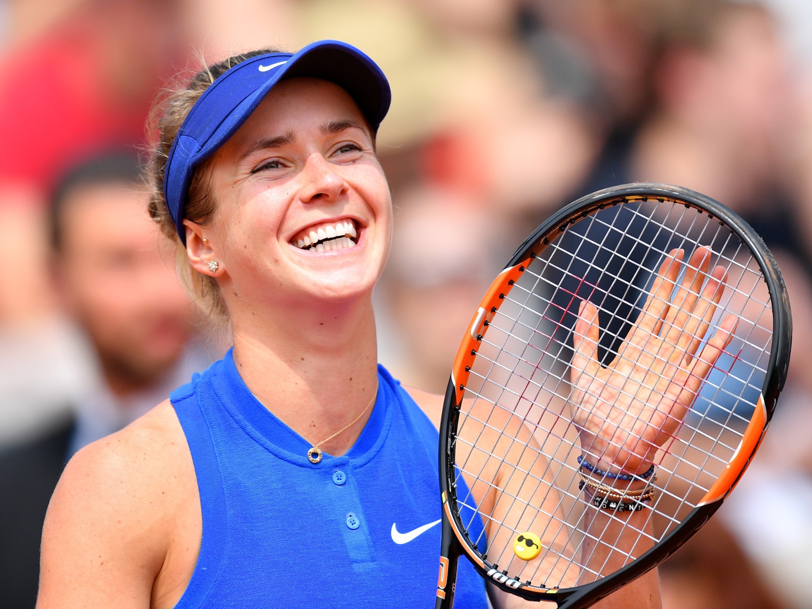 Ukrainian tennis player Elina Svitolina smiles on court
