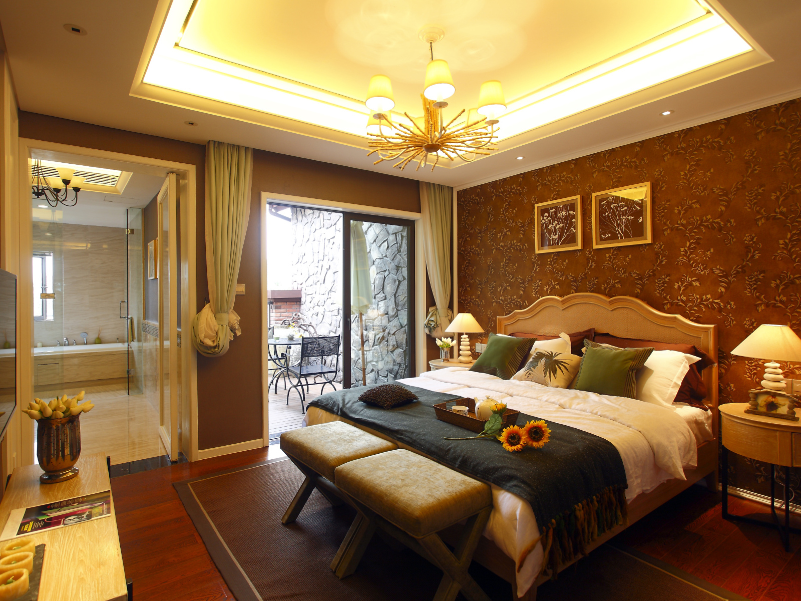 Красивая спальня с большой кроватью и телевизором 