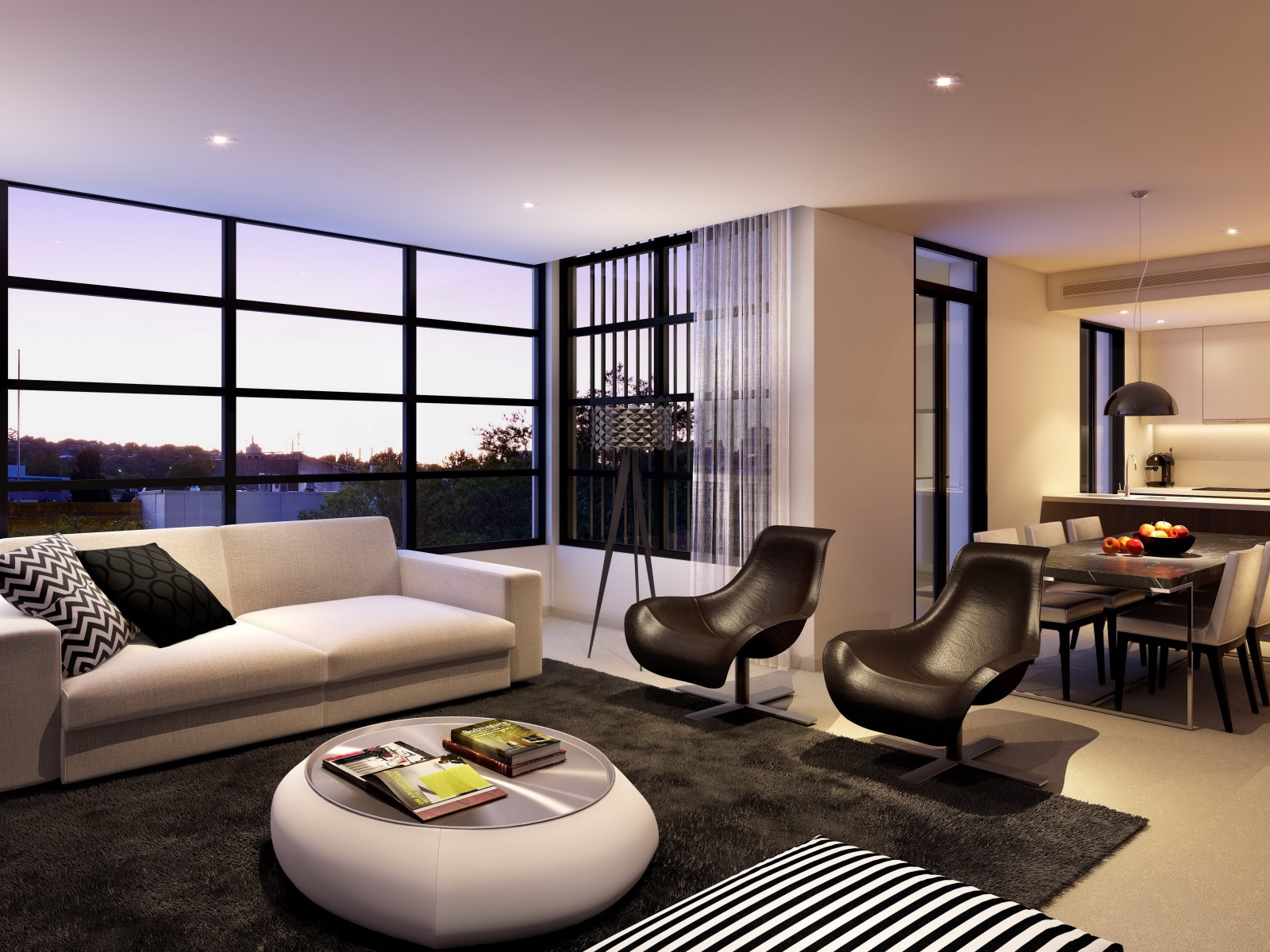 Диван, два кожаных кресла и стол в гостиной с большим окном 