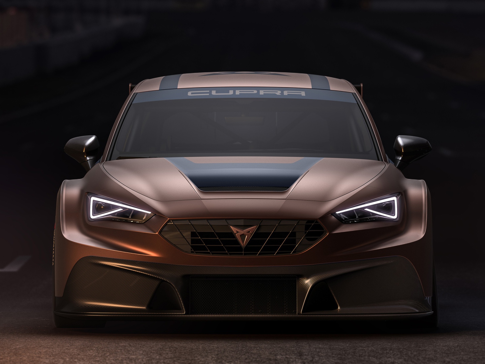 Коричневый автомобиль Cupra Leon Competition 2020 года вид спереди