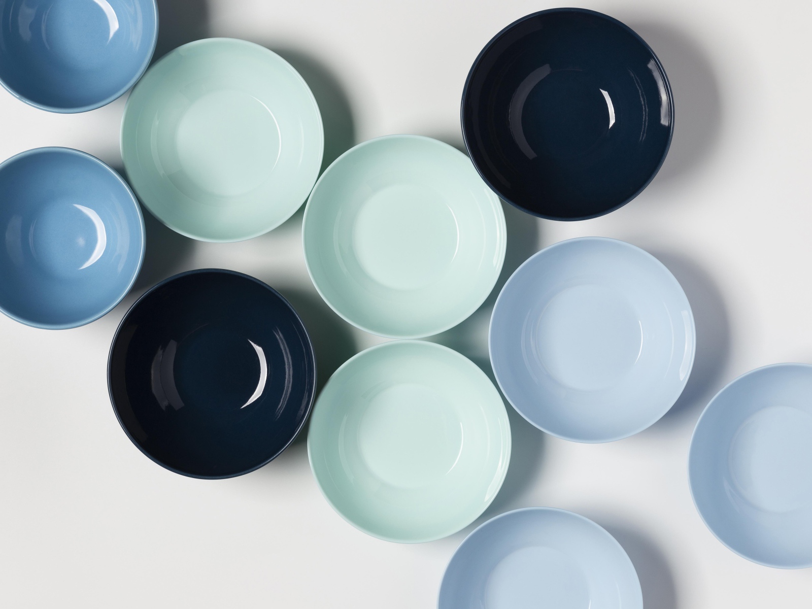 Multicolored porcelain bowls on the table
