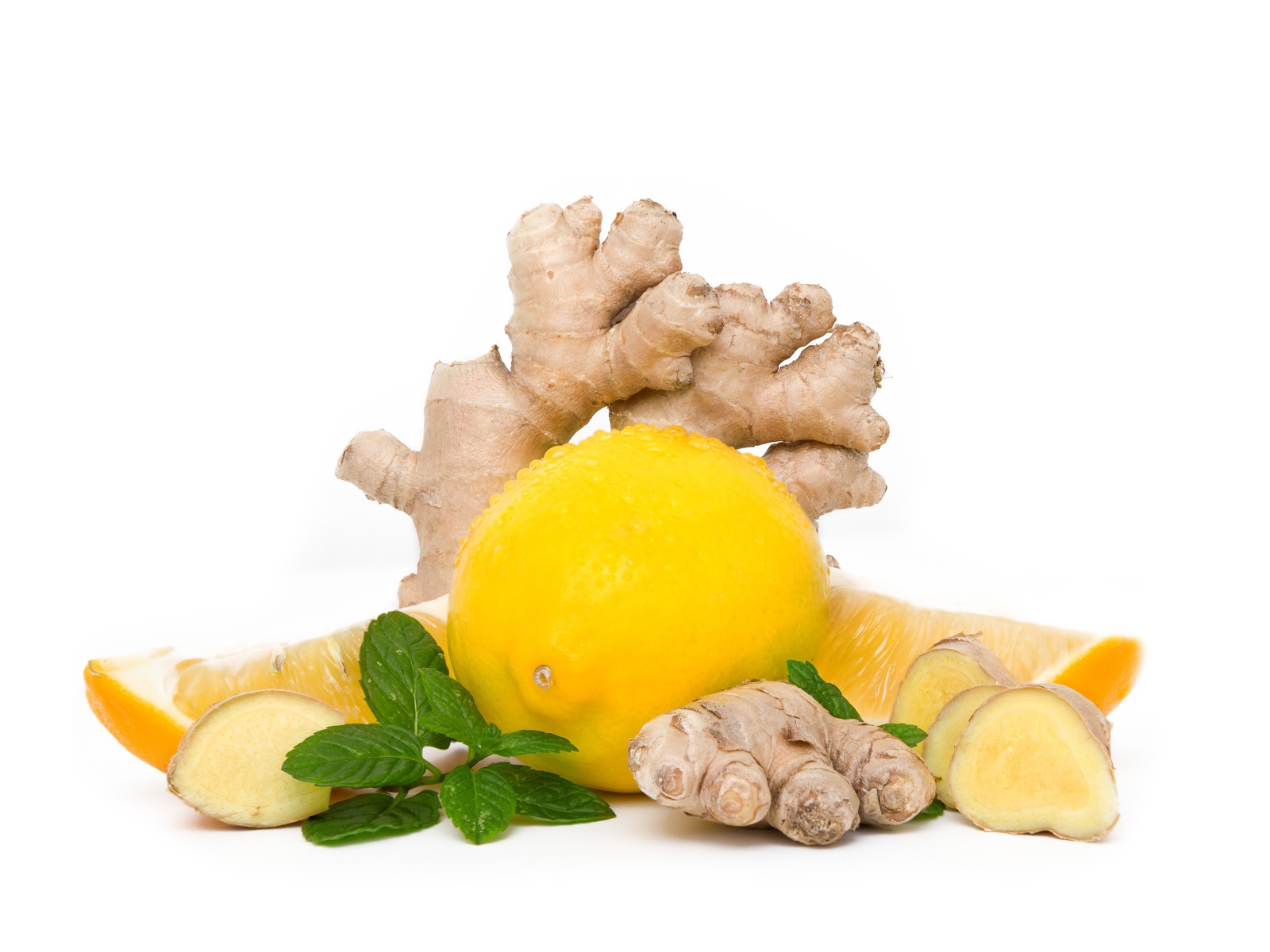 Fresh lemon with ginger root and mint on white background