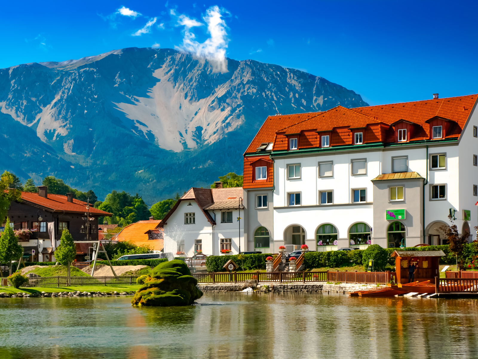 Big beautiful white house at the foot of the mountain, Austria