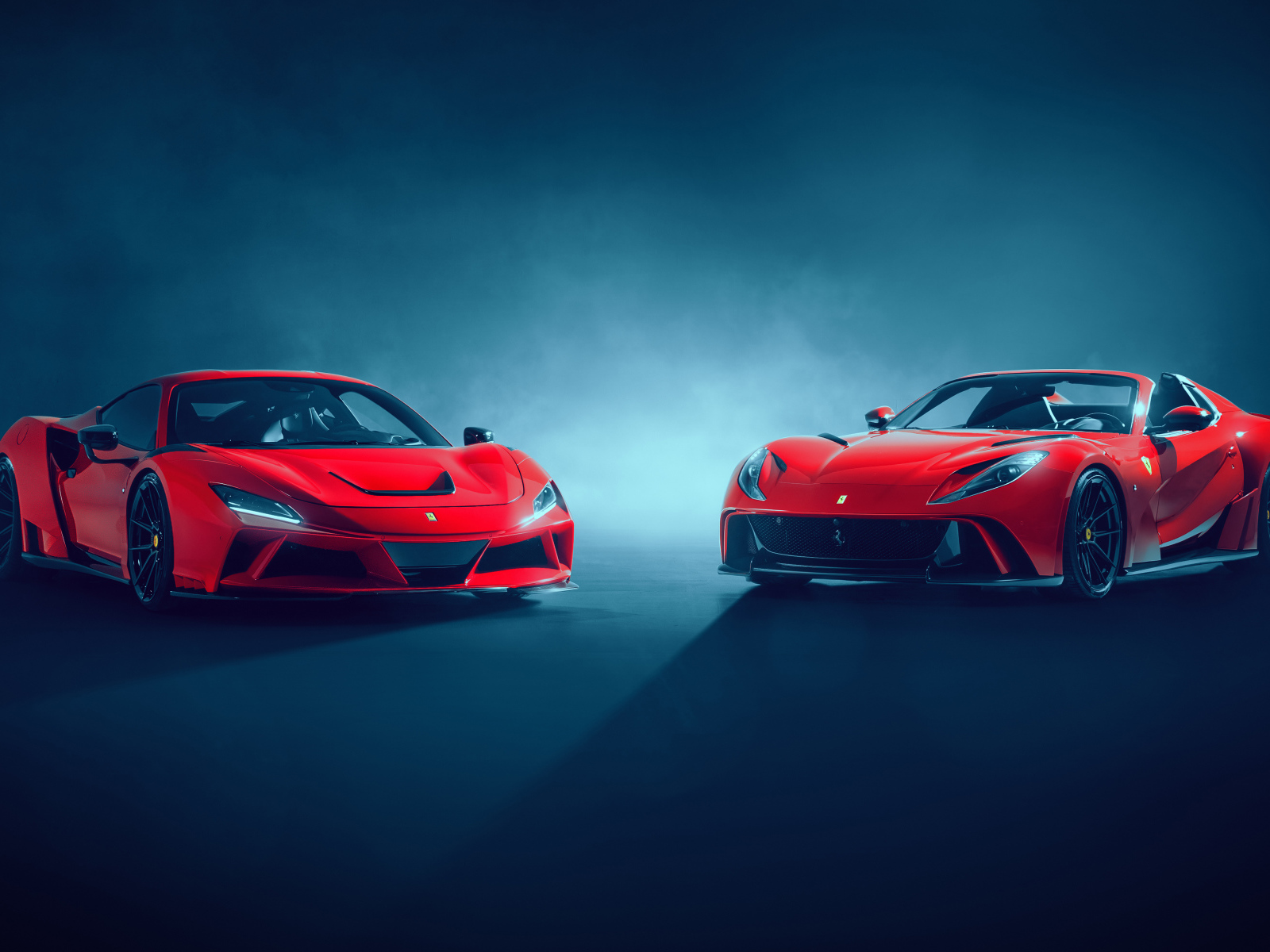 Два красных автомобиля Novitec Ferrari 812 GTS N-Largo 2021 года на сером фоне