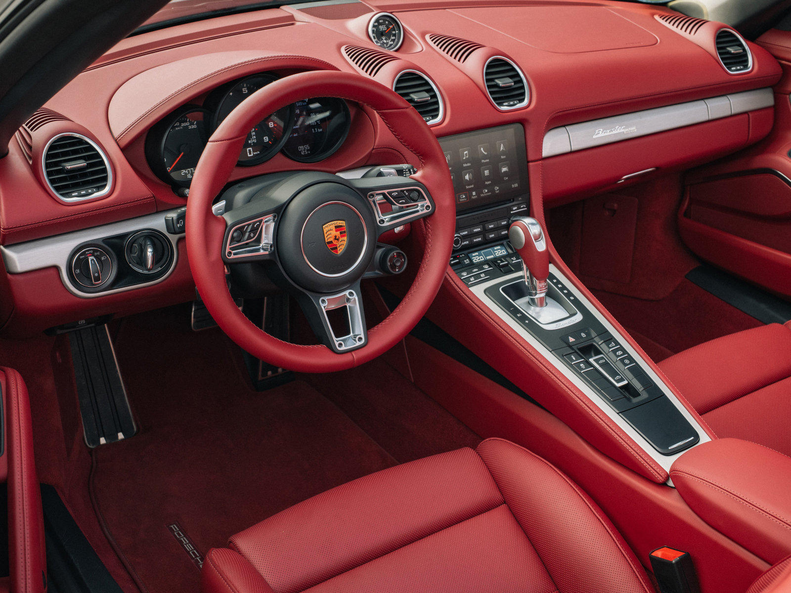 Красный кожаный салон автомобиля Porsche Boxster 25 Jahre 2021 года