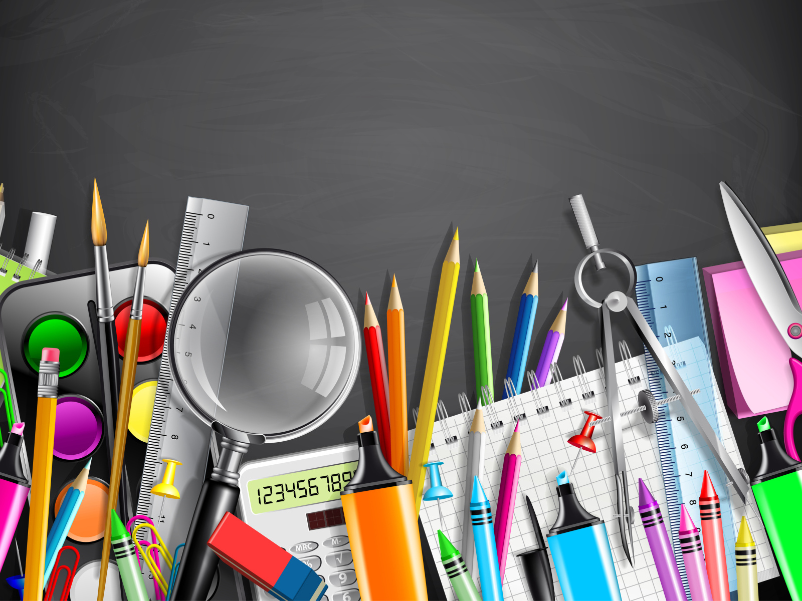 Разноцветные канцелярские предметы на сером фоне