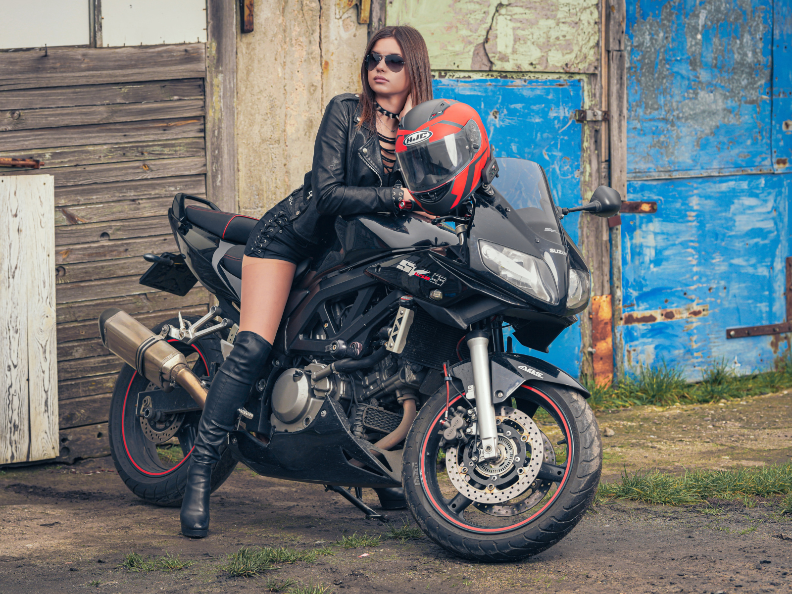Young girl on a motorcycle Suzuki SV650S