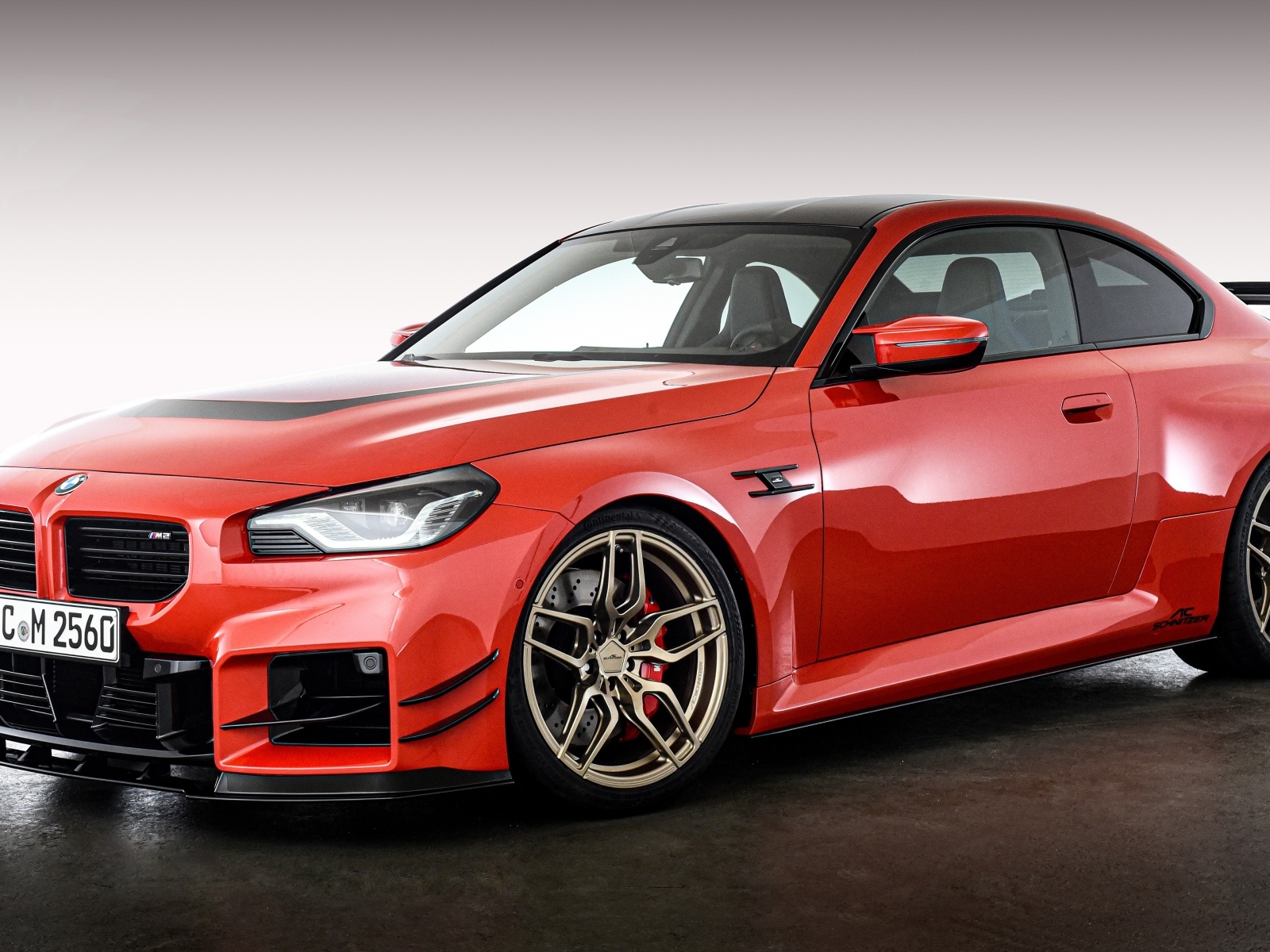 Быстрый красный автомобиль AC Schnitzer ACS2 Sport 2023