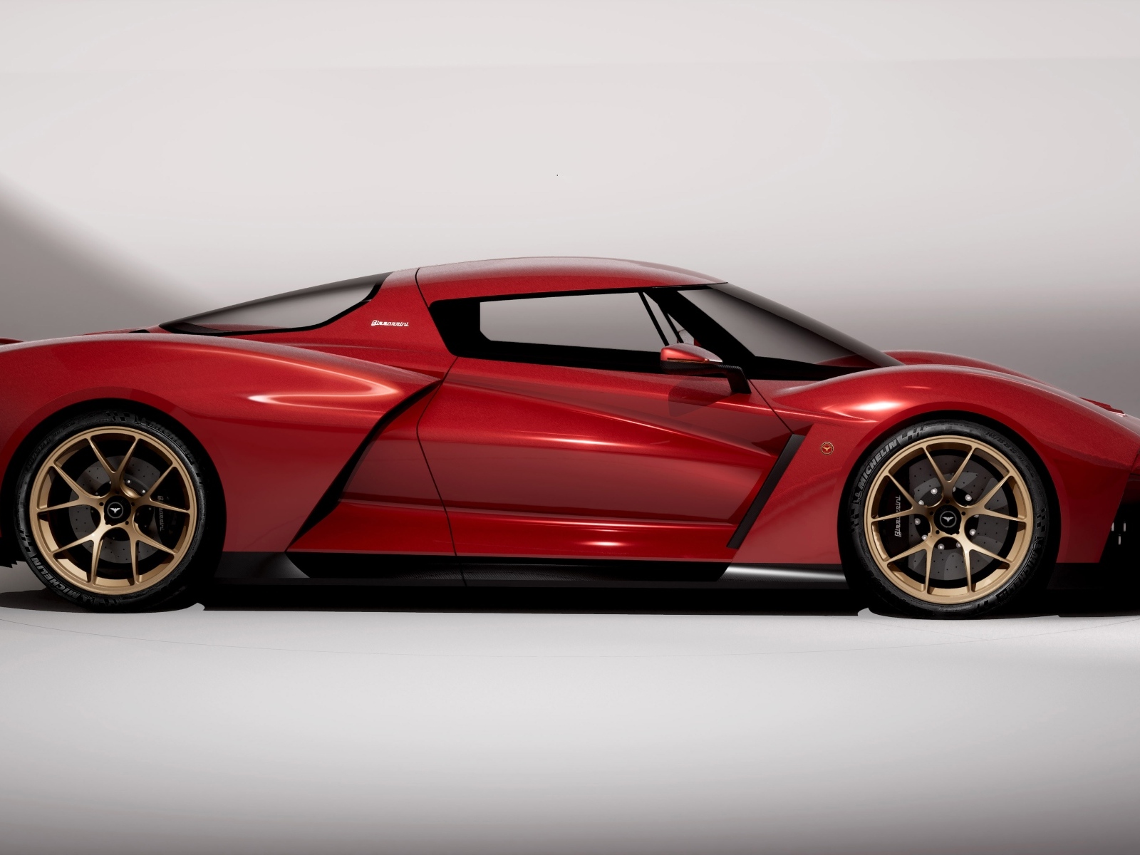 Красный автомобиль Bizzarrini The Giotto вид сбоку