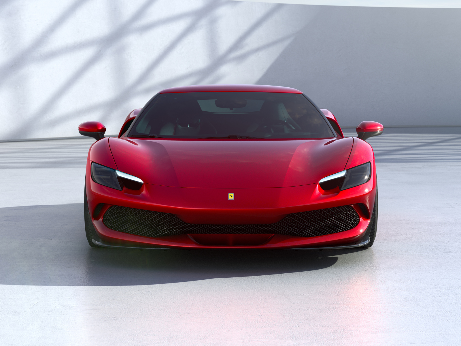 Красный Ferrari 296 GTB 2022 года вид спереди