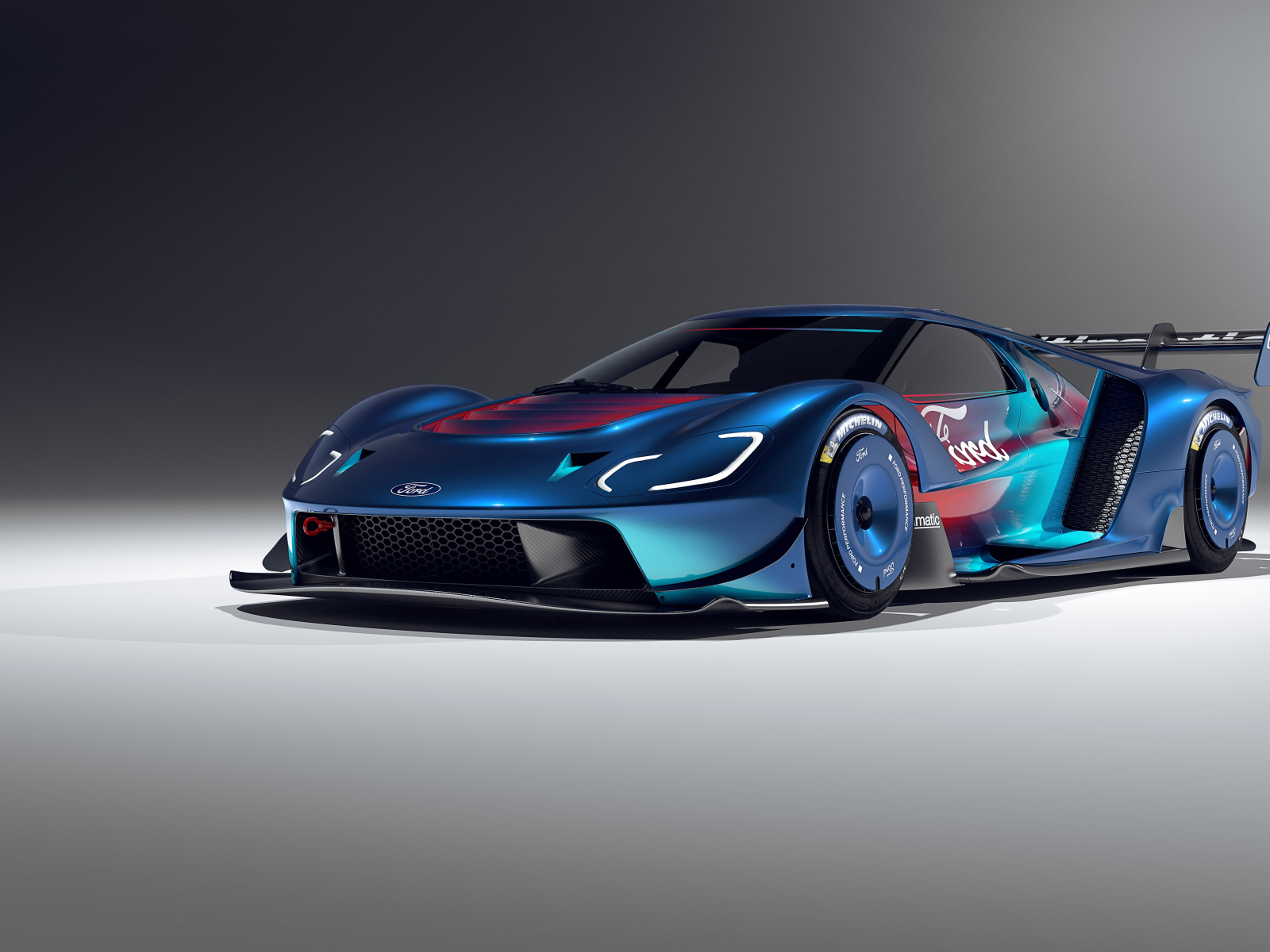 Автомобиль Ford GT Mk IV на сером фоне