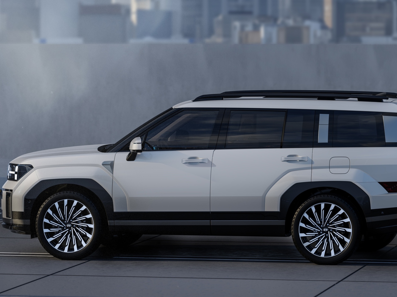 Вид сбоку на Hyundai Santa Fe 2024 года