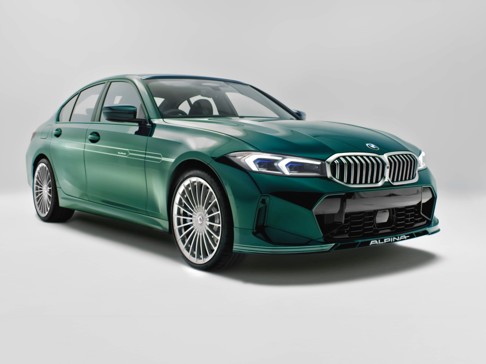 Зеленый автомобиль Alpina B3 50 Years Of BMW