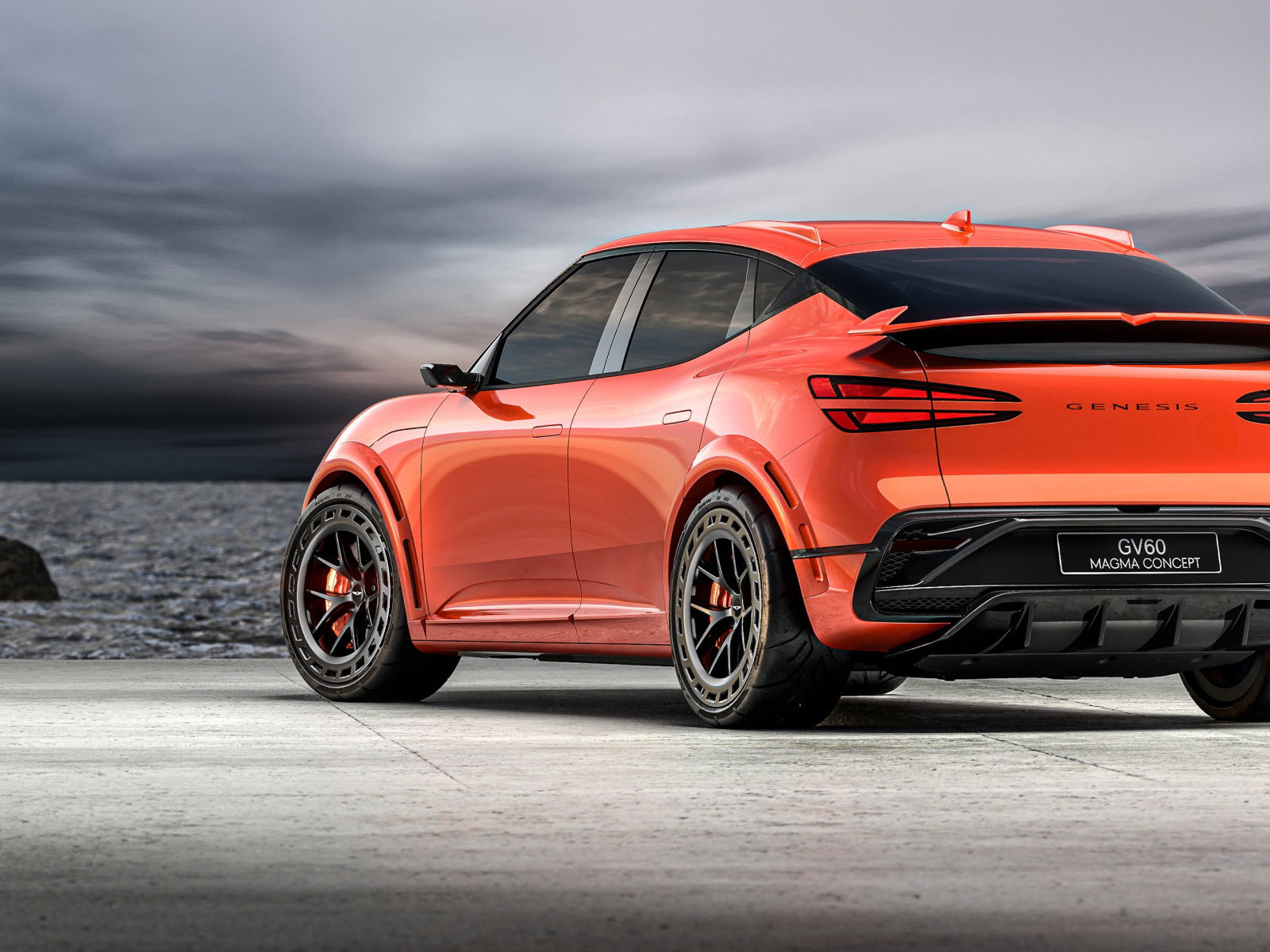 Вид сзади на автомобиль Genesis GV60 Magma Concept 2024 года