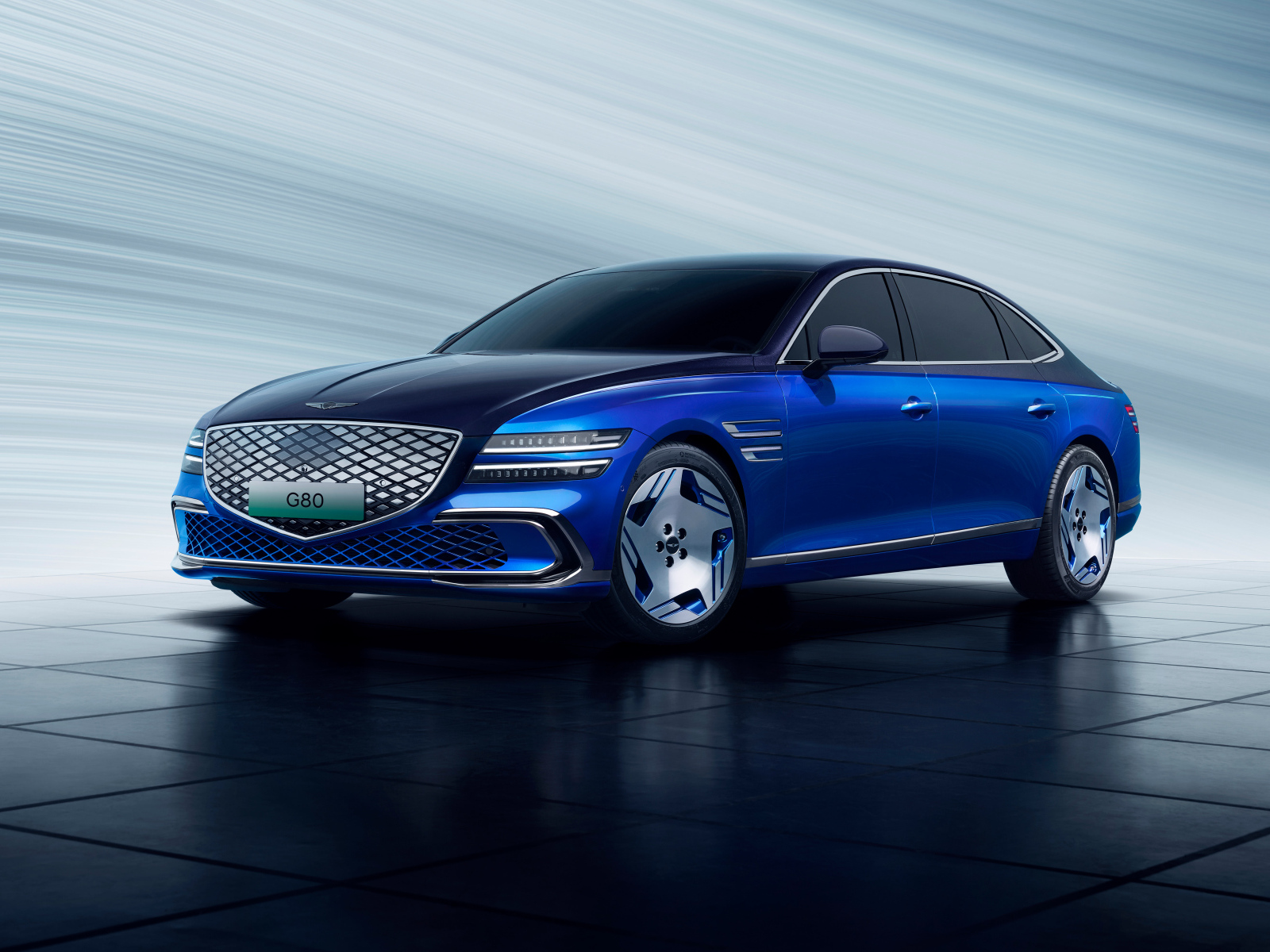 Синий автомобиль Genesis Electrified G80 2024 года