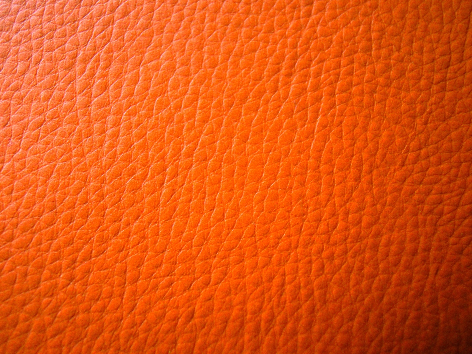 Оранжевый кожаный фон 