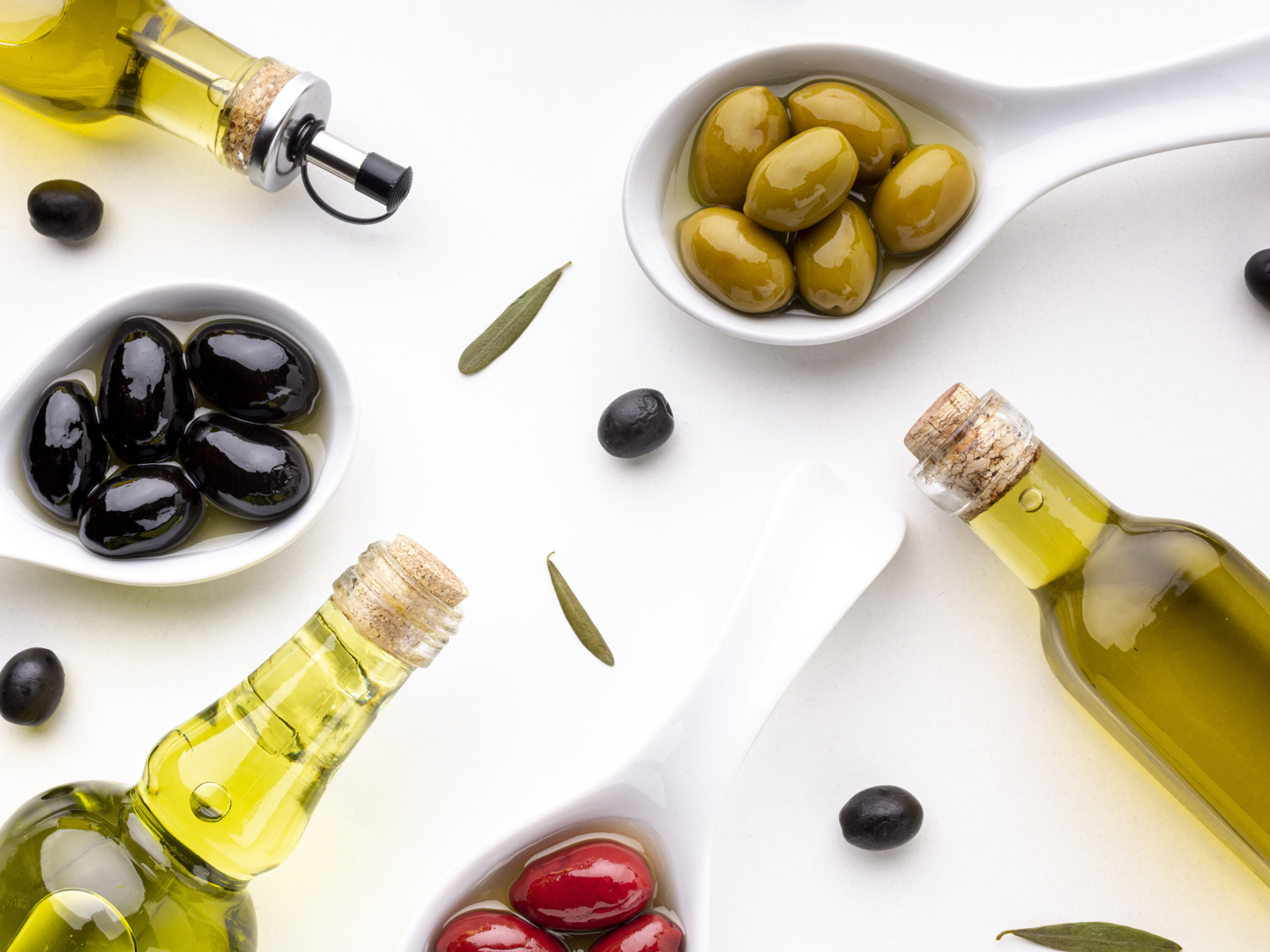 Oil with olives on the table